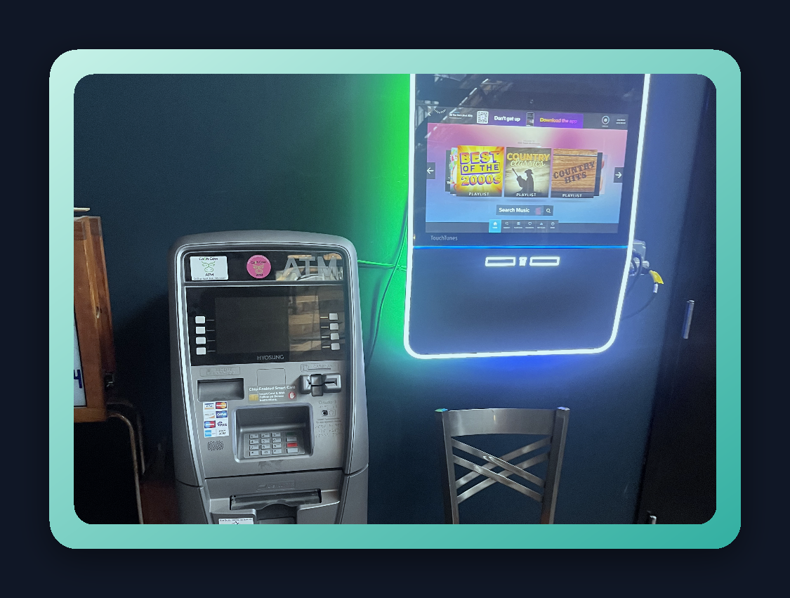 Swipe Tech ATM and digital jukebox installed in a bar